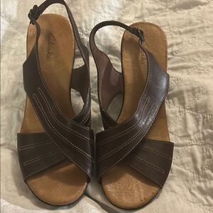 Clarks Brown Sandals with Slingback Design and Crisscross Straps‎
